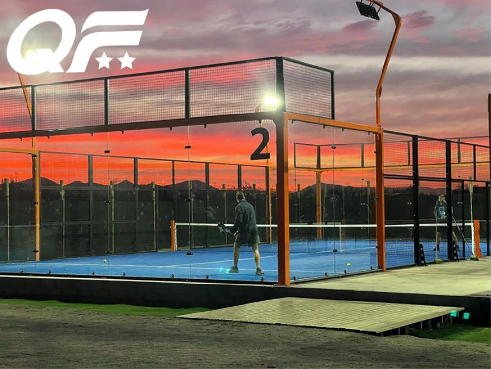 a padel court at sunset